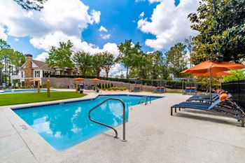 Two resort-style pools with expansive sun deck